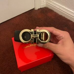 Salvatore Ferragamo Black and Gold Belt